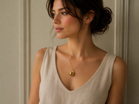 Gold Brass Sphere Locket with Tiny Leaf